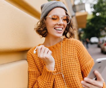 photo of a girl using phone